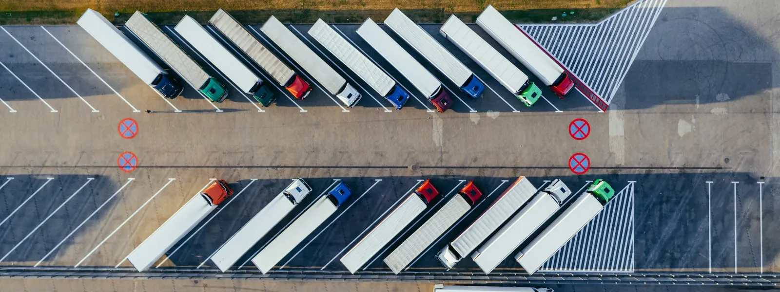 Trucks parked in a logistics yard seen from above