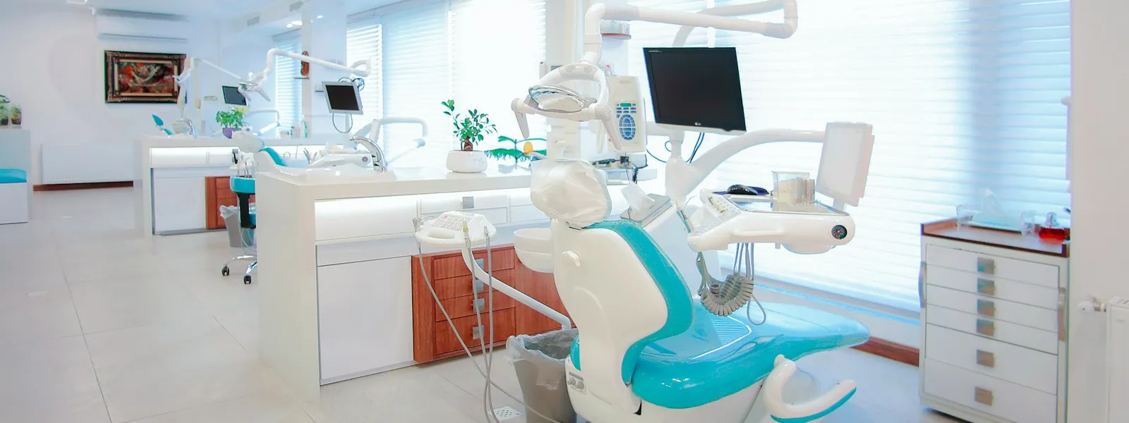 Modern dental clinic with chairs and advanced equipment